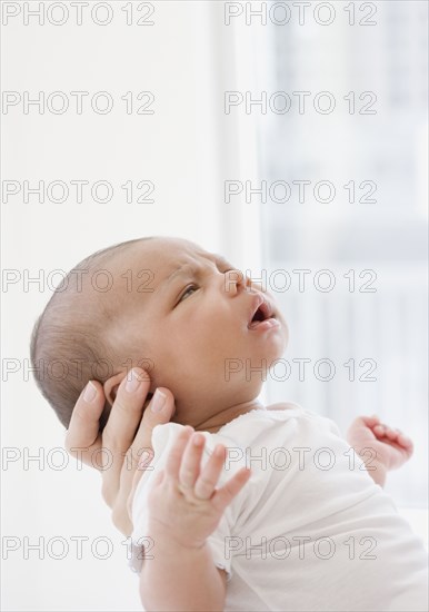 Mother holding newborn baby