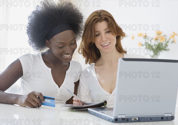 Two women online shopping