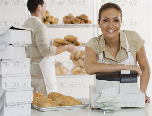 Portrait of Hispanic female bakery worker