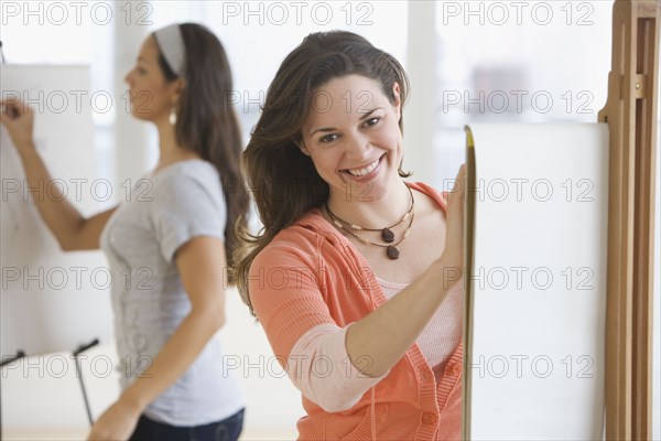 Female college students in art class