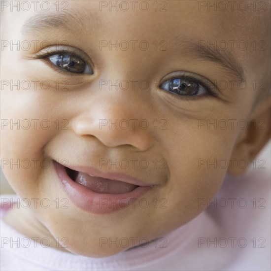 Close up of African American baby smiling