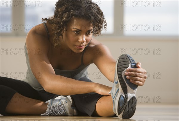 African woman stretching