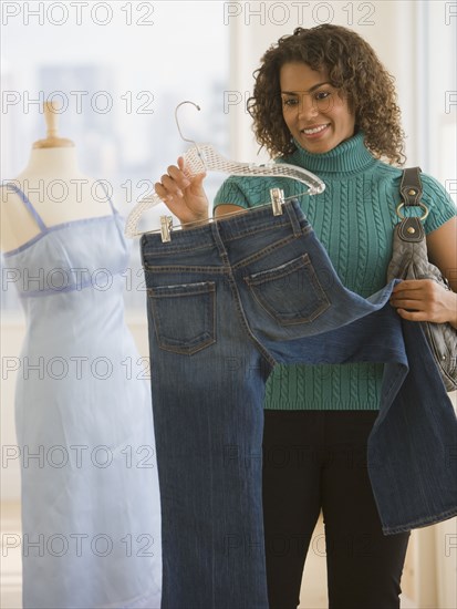 African woman shopping for clothing