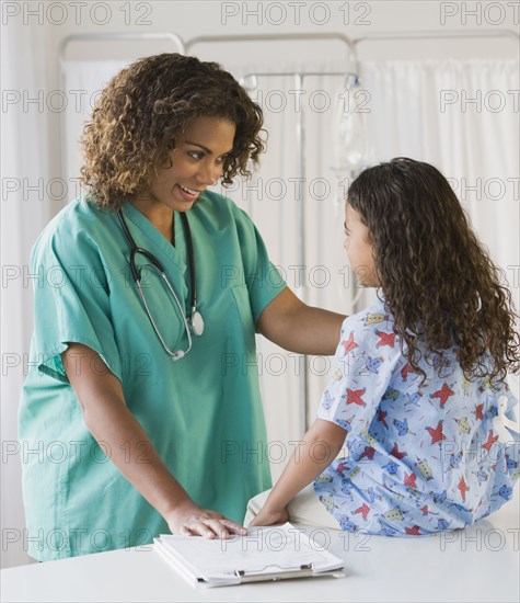 African girl talking to doctor