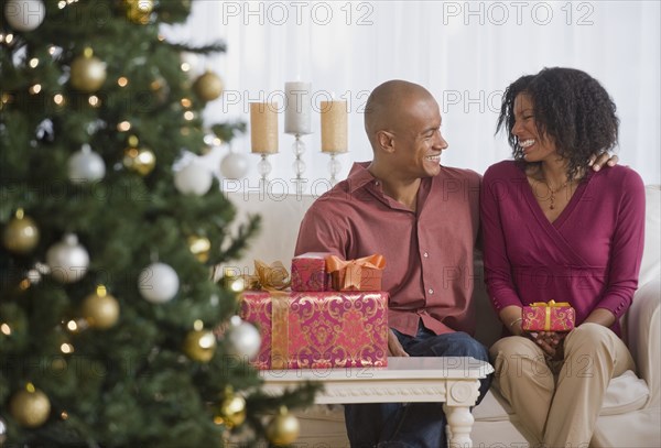 African couple with Christmas gifts