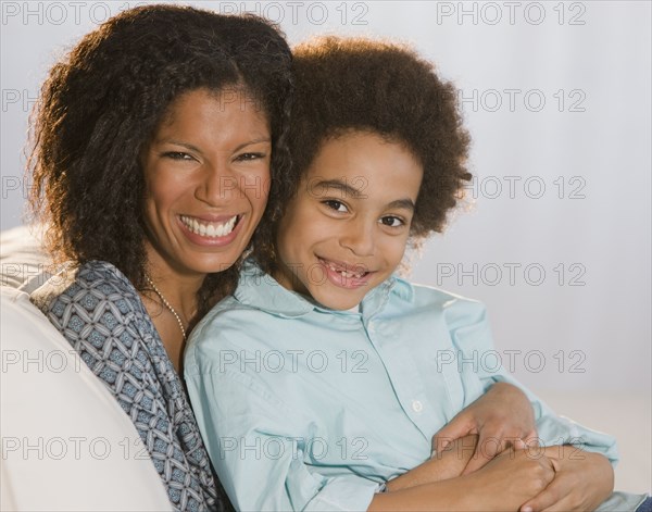 African mother and son hugging