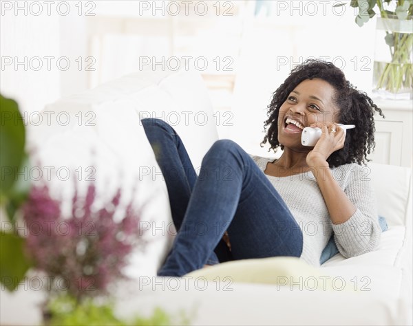 African woman talking on telephone