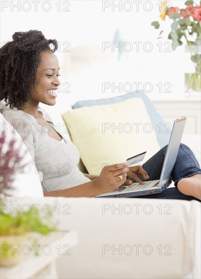 African woman shopping online