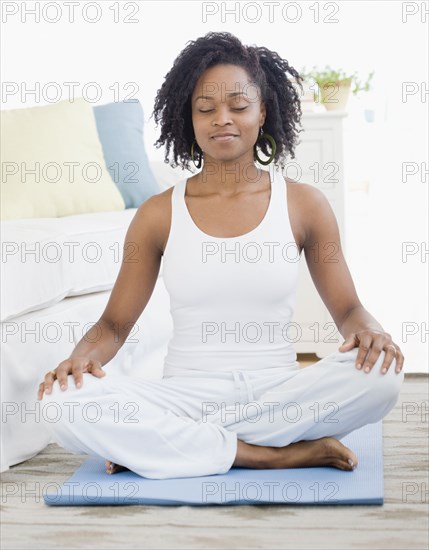 African woman meditating