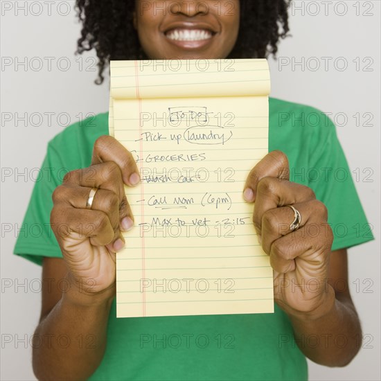 Africa woman holding to do list