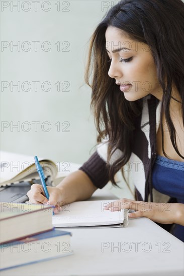 Middle Eastern woman studying
