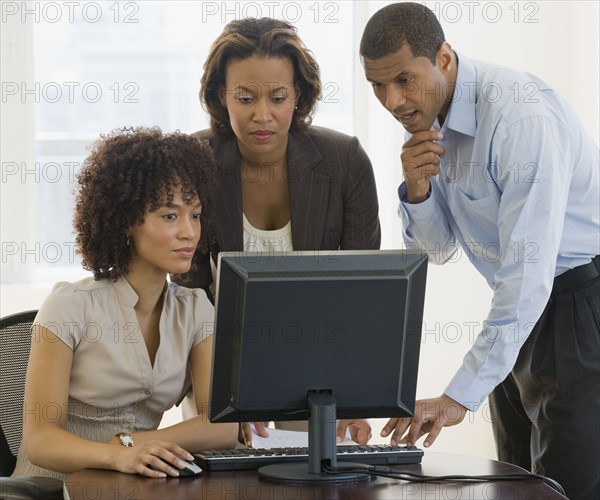 African business people working on computer