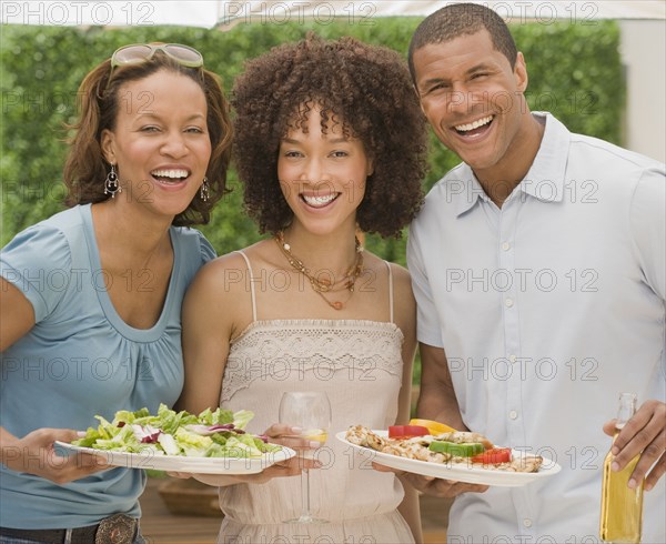 African man and women at cookout