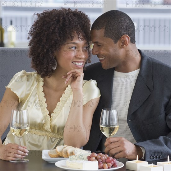 African couple dining at restaurant