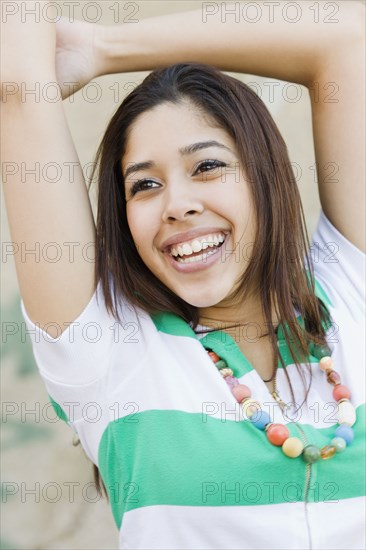 Confident Hispanic woman smiling