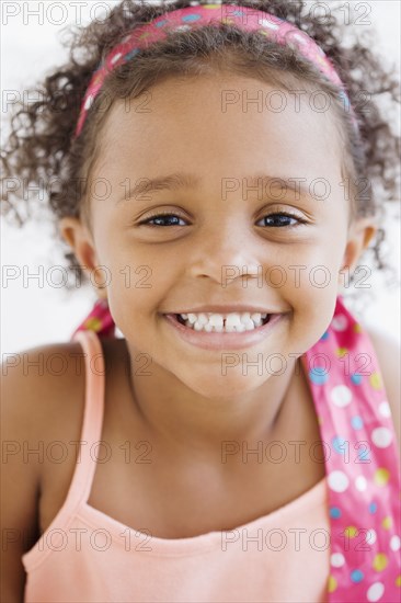 Close up of mixed race girl smiling