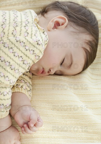 Mixed race baby girl sleeping