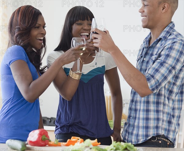 African friends toasting