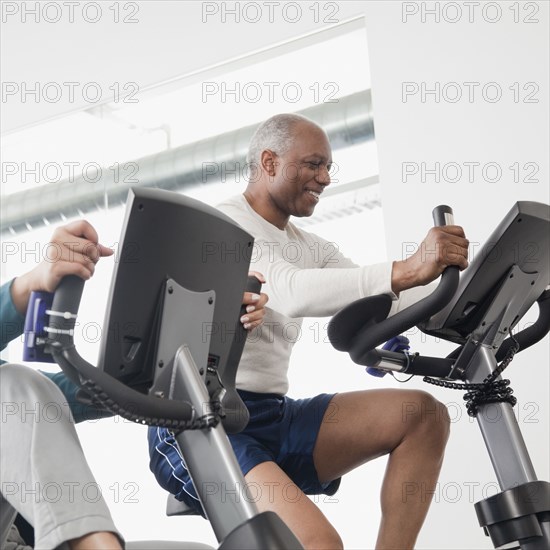 African man exercise in health club