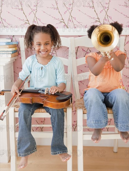 African girls playing instruments