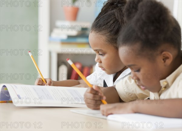 African girls doing homework
