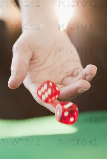 Woman throwing dice