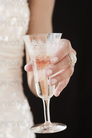 Woman holding champagne flute