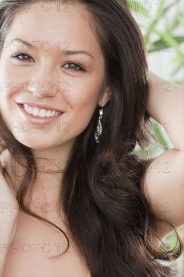 Mixed race woman smiling