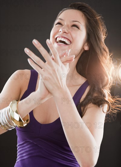 Mixed race woman dancing