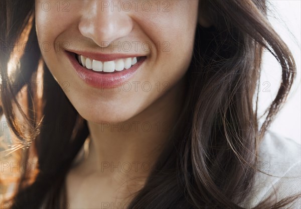 Close up of Hispanic woman's smile
