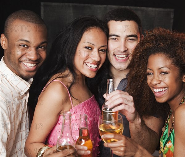 Couples drinking at bar