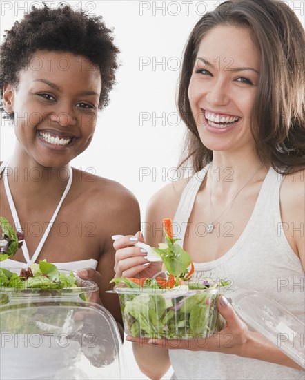 Friends eating salad