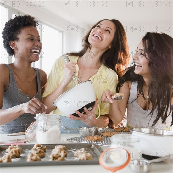 Friends making cookies together