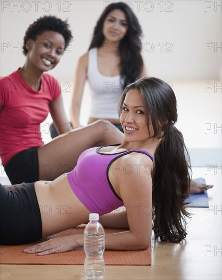 Friends relaxing together after workout