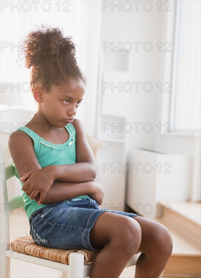 Mixed race girl pouting