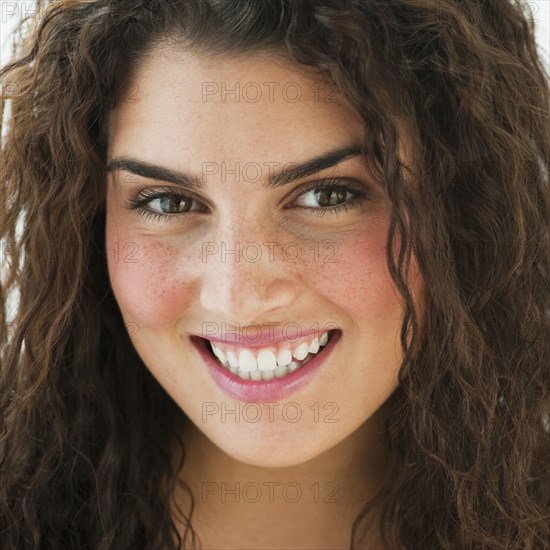 Mixed race woman smiling