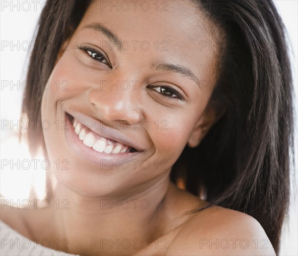 Mixed race woman smiling