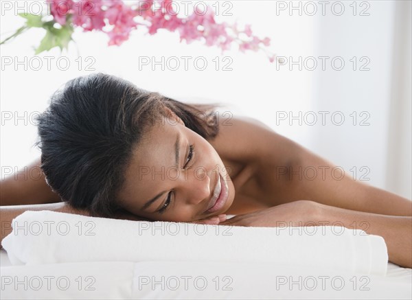 Mixed race woman waiting for spa treatment