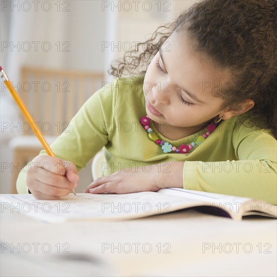 Hispanic girl doing homework