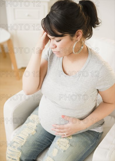 Pregnant Hispanic woman with headache