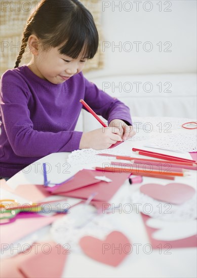 Chinese girl making Valentine's Day cards