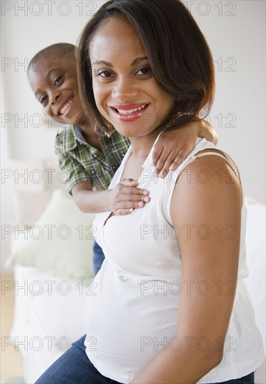 Smiling Black mother and son