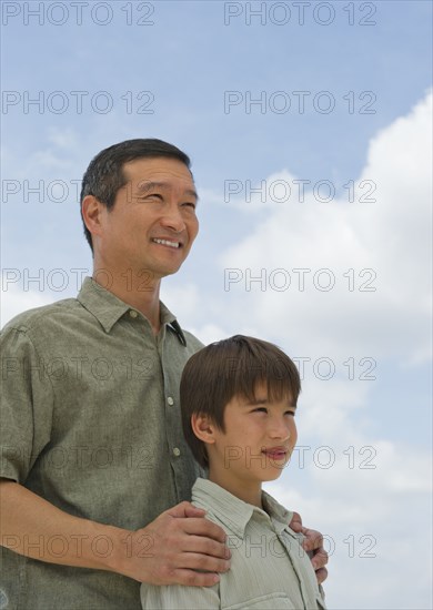 Smiling father and son