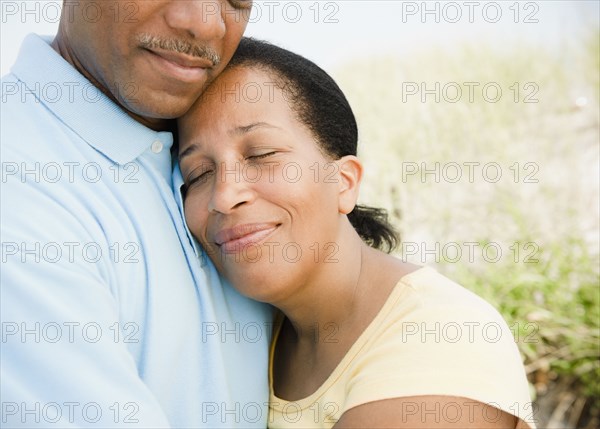 Black couple hugging