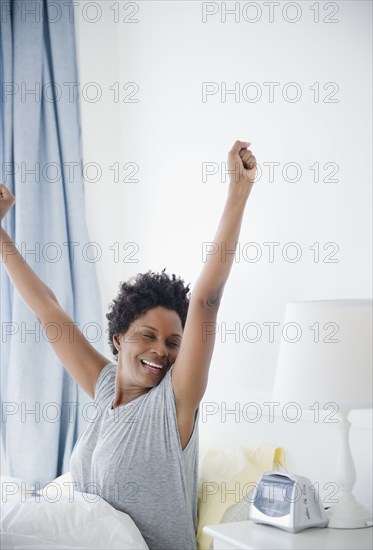 Black woman waking up in the morning