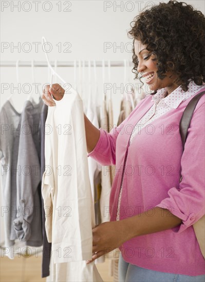 African American woman shopping for clothing