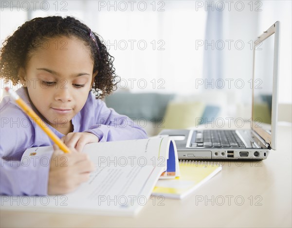 African American girl doing homework