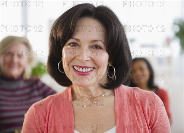 Smiling woman with friends