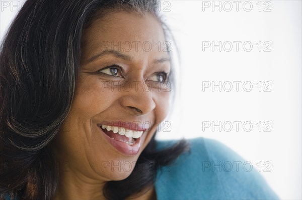 Smiling mixed race woman