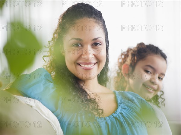 Smiling mother and daughter